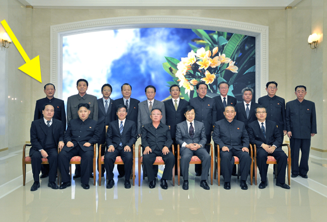 Kim Won Hong (tagged) stands behind Kim Jong Un during a photo-op with Kim Jong Il and former PRC Ambassador to the DPRK Liu Hongcai. Standing next to General Kim is another member of the Gang of Five, Mr. Kim Kyong Ok. (Photo: NK Leadership Watch file photo).
