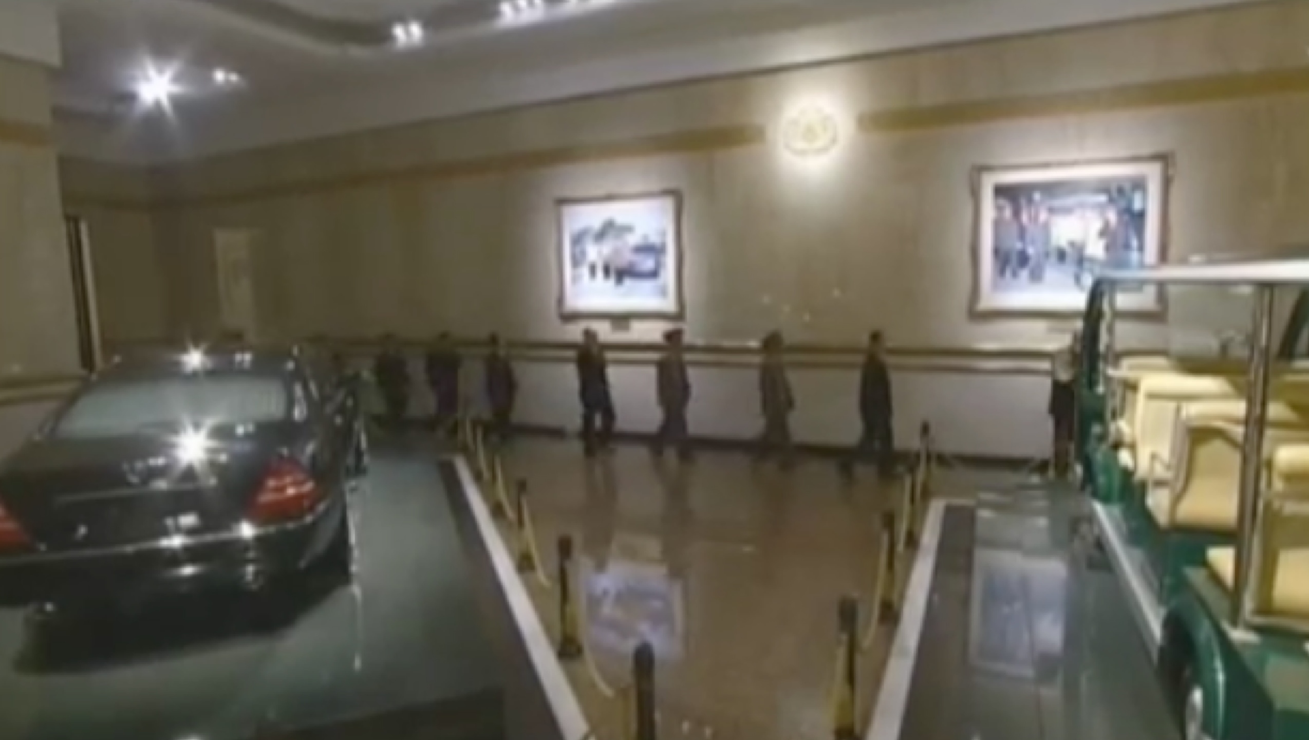 Senior DPRK officials walk past displays of Kim Jong Il's personal car and electric mobility cart on February 16, 2017 at Ku'msusan Palace of the Sun in Pyongyang (Photo: Korean Central Television).